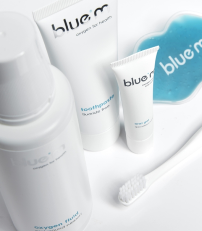 Inside the blue m post surgical kit showing oxygen fluid oral gel toothpaste and surgical brush